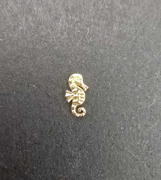 gema dental oro 18k caballito de mar glowgems tooth gem