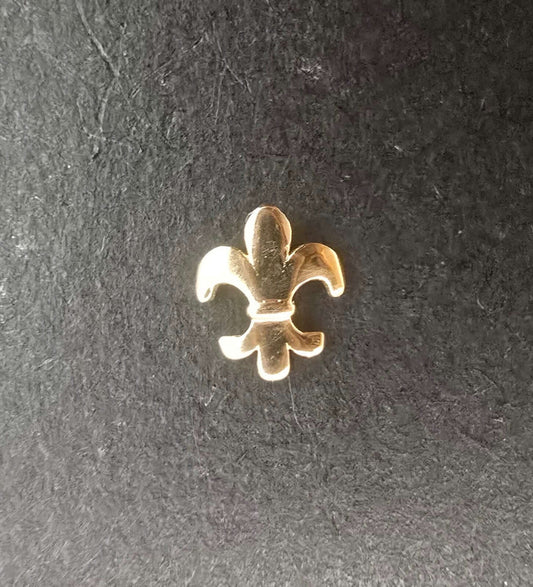 gema dental oro 18k flor dorada glowgems tooth gem