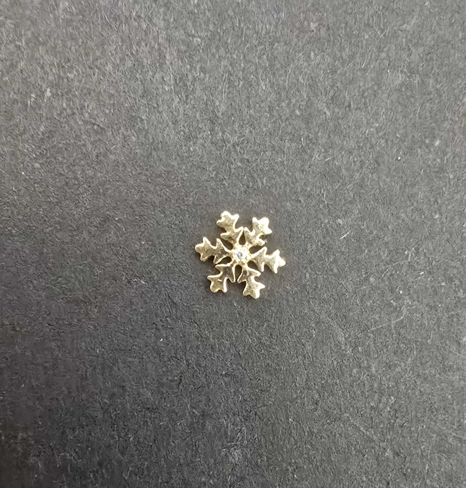 gema dental oro 18k copo de nieve glowgems tooth gem